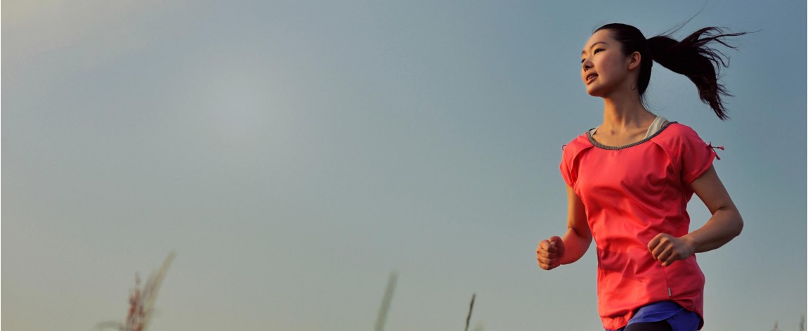 Woman in red running