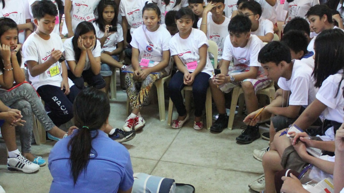 Children learning first aid skills