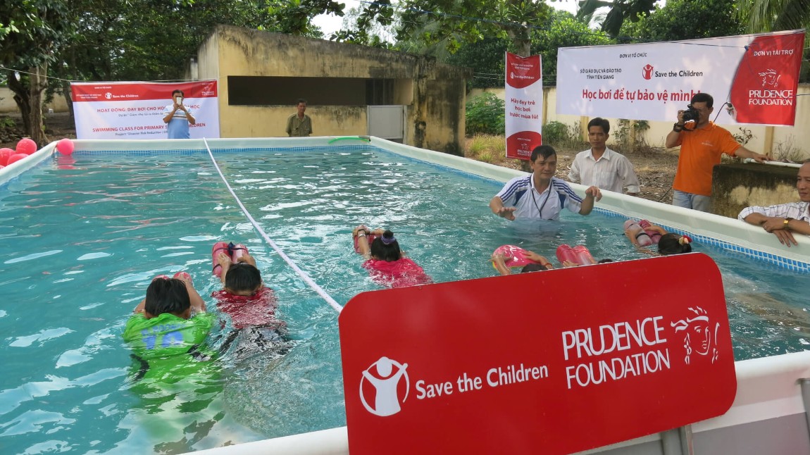 Children learning to swim to safety